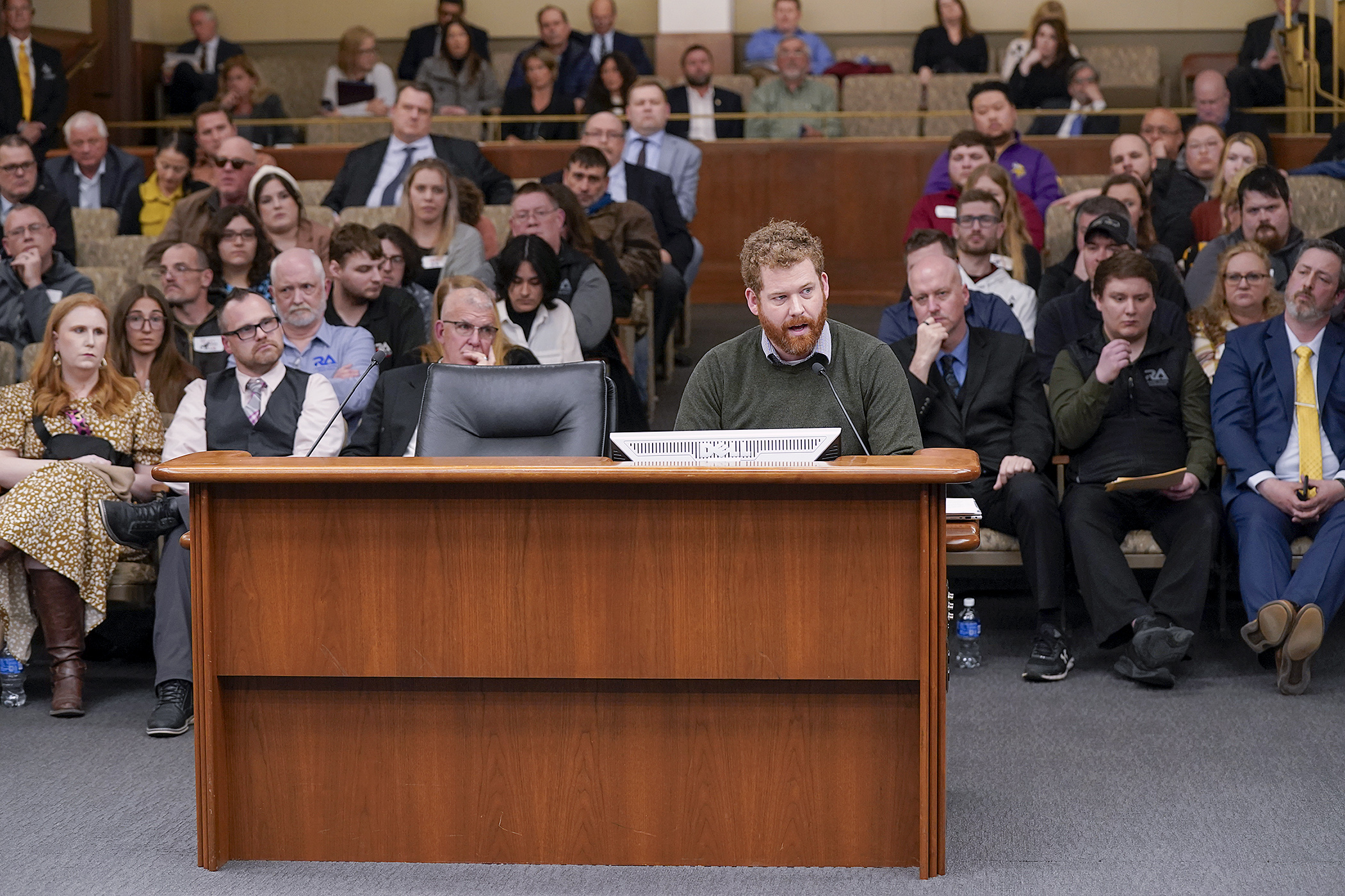 Rep. Zack Stephenson introduces HF5274 to the House Commerce Finance and Policy Committee April 8. The bill would prohibit wagering on historical horse racing and prohibit licensed racetracks from offering any forms of gambling except horse racing and card room operations. (Photo by Michele Jokinen)